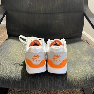 A pair of 10.5 Nike Air Max 1. Worn once or twice briefly. Excellent condition.